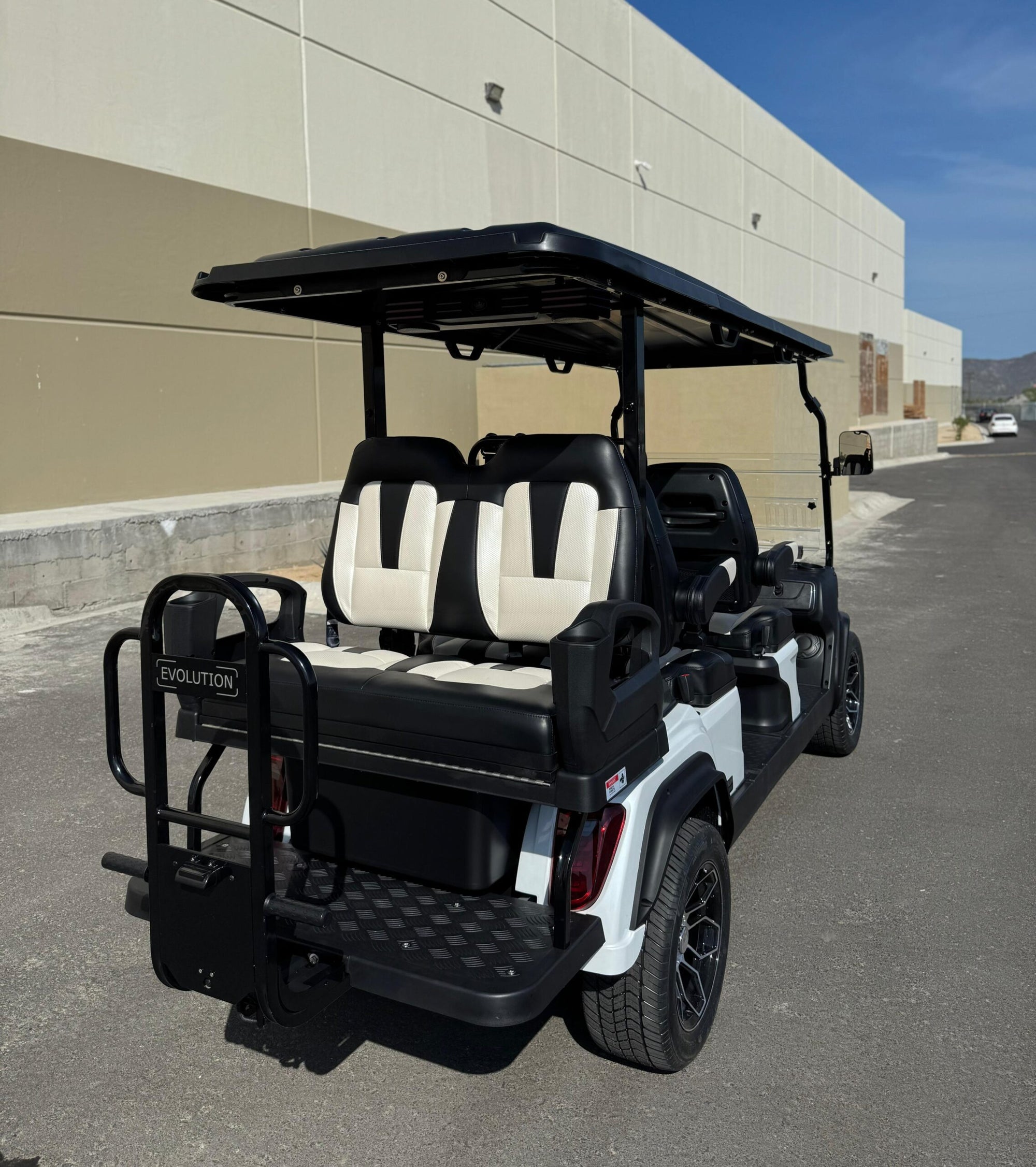 D5 Ranger 4+2 Plus cart with black and white seats  - Hardy Carts & Equipment
