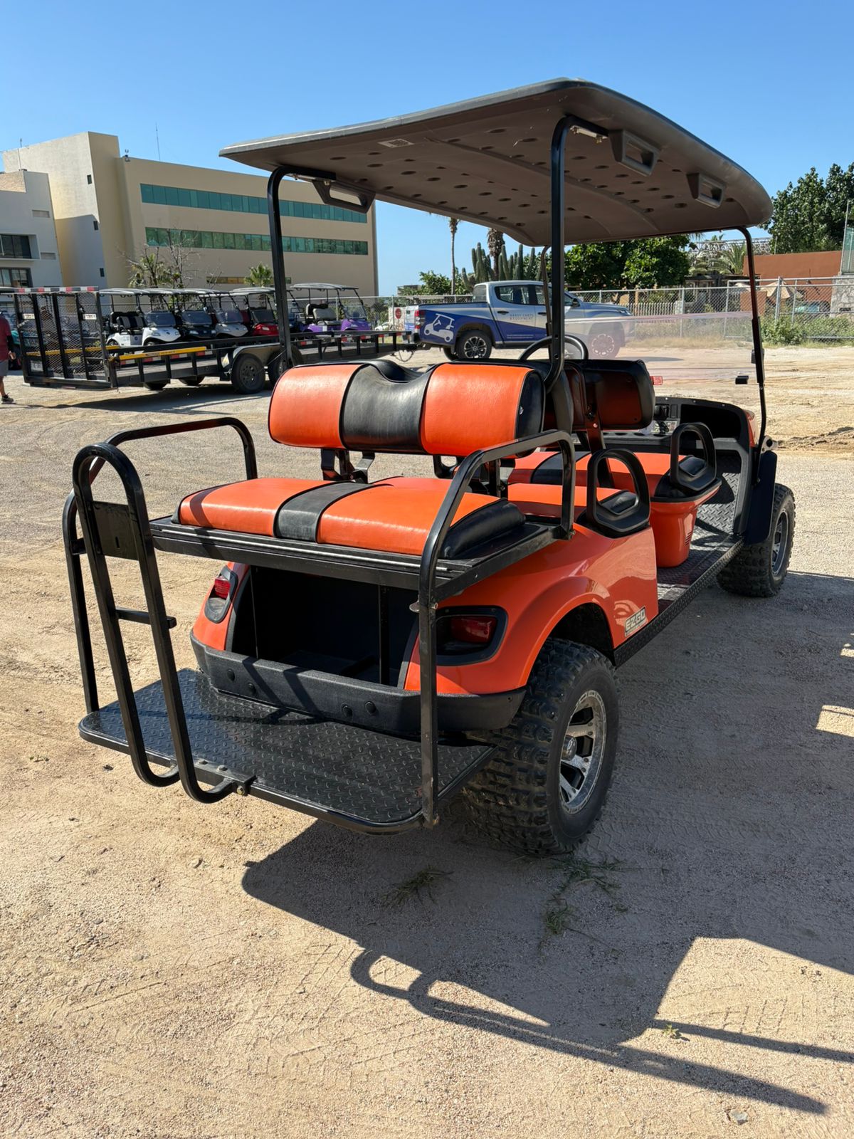 EZGo Express L6 E - Orange with Black Seats - Hardy Carts & Equipment
